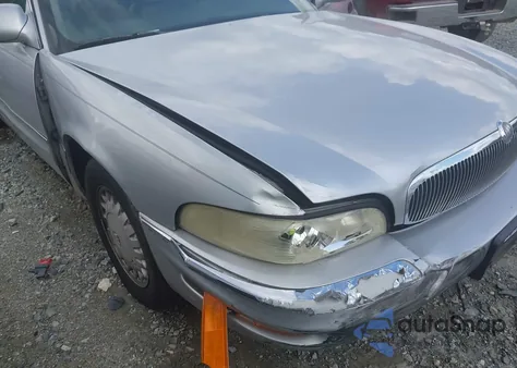 1999 Buick Park Avenue Ultra from USA, damaged, VIN 1G4CU5212X4615667